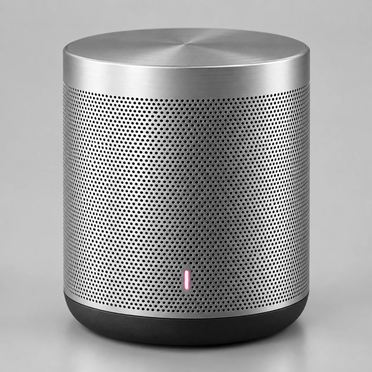 Brushed silver portable speaker with a pink indicator